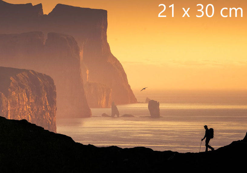Lone hiker on coastal ridge on Kalsoy island, Faroe Islands photography print, 20 × 30 cm (7.9 × 11.8 inches)