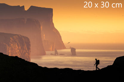 Lone hiker on coastal ridge on Kalsoy island, Faroe Islands photography print, 21 × 30 cm (8.3 × 11.8 inches)